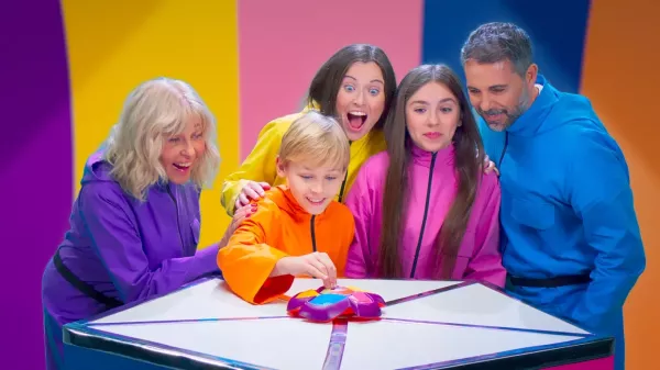 A group of people around a table<br /> 
<br /> 
AI-generated content may be incorrect.