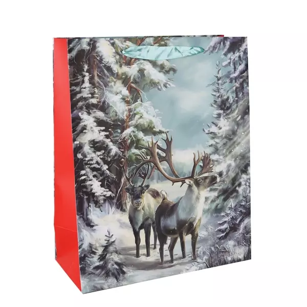 Rénszarvasok a havas erdőben ajándéktasak - 31 x 42 cm