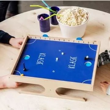 Jogo de tabuleiro magnético de destreza Klask - .Imagem