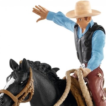 Schleich: Nyerges bronc lovaglás cowboyjal 41416 - . kép