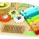 Tooky Toy: Stół zabawowy z instrumentami i aktywnościami z drewna - .zdjęcie 